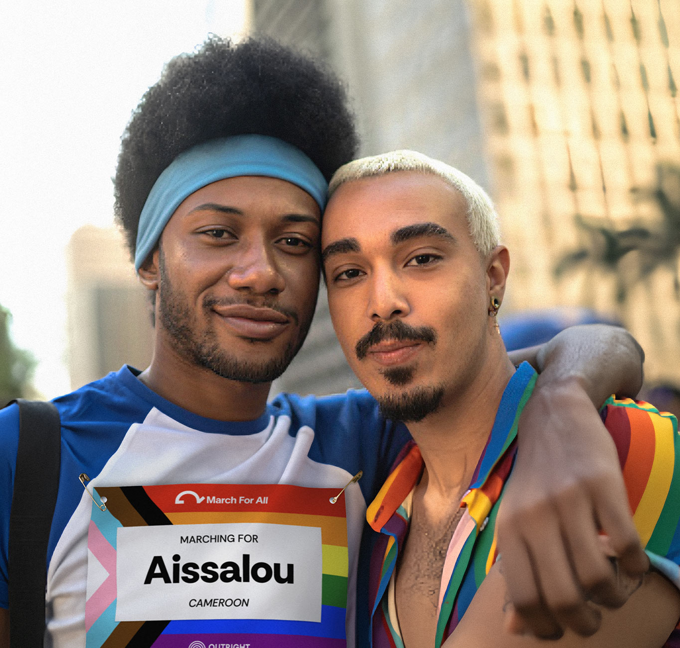 Two marchers, one with bib Two marchers, one with bib